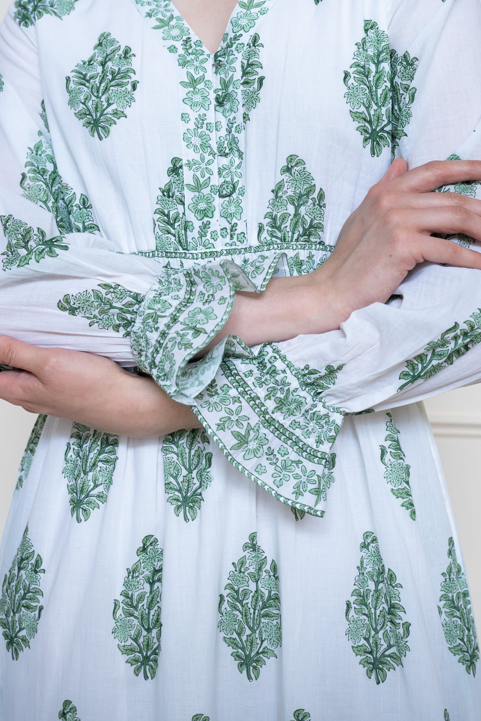 Close up of sleeve cuffs on Atherton Dress in Green showing comfortable arm fit and premium finish