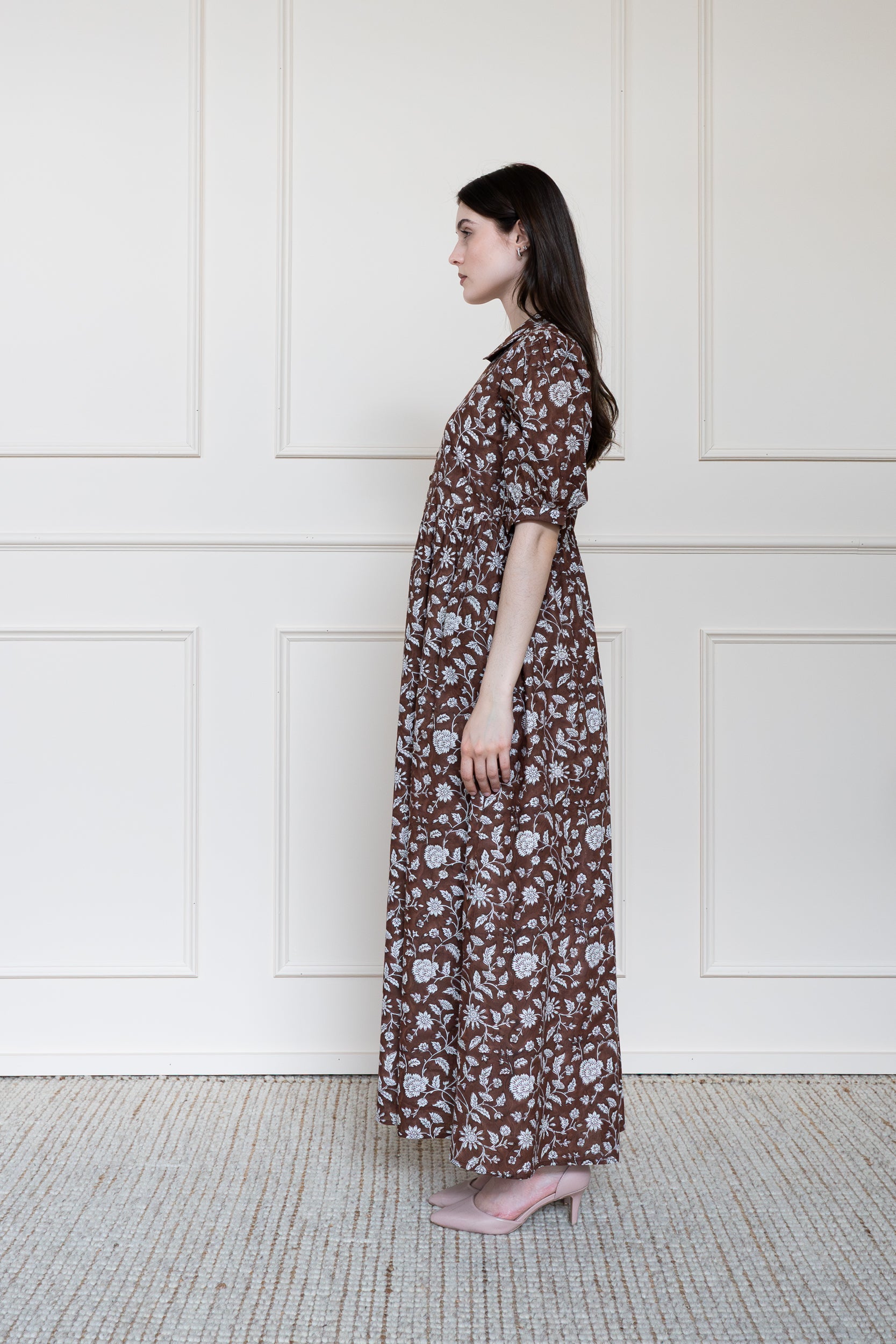 Side view of Balmoral Dress in Chocolate Blossom Brown showing floral hand block print pattern and relaxed summer styling.