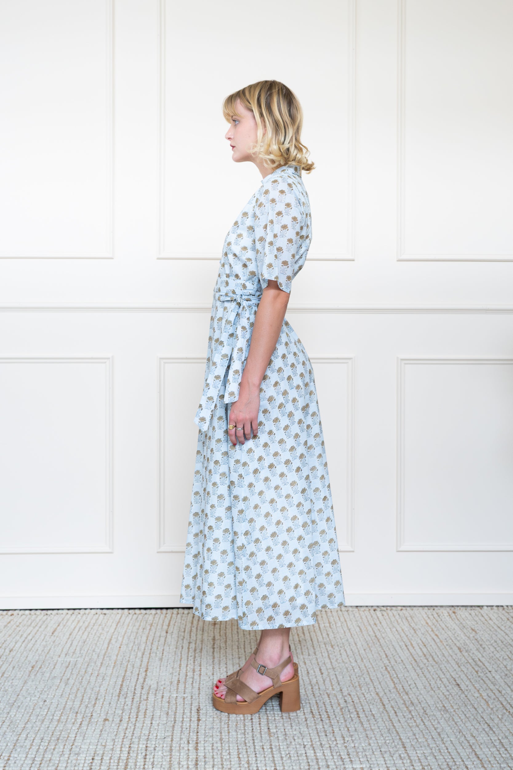 Side view of Bowral Dress in Highlands Mist Blue showing floral hand block print pattern and relaxed summer styling.