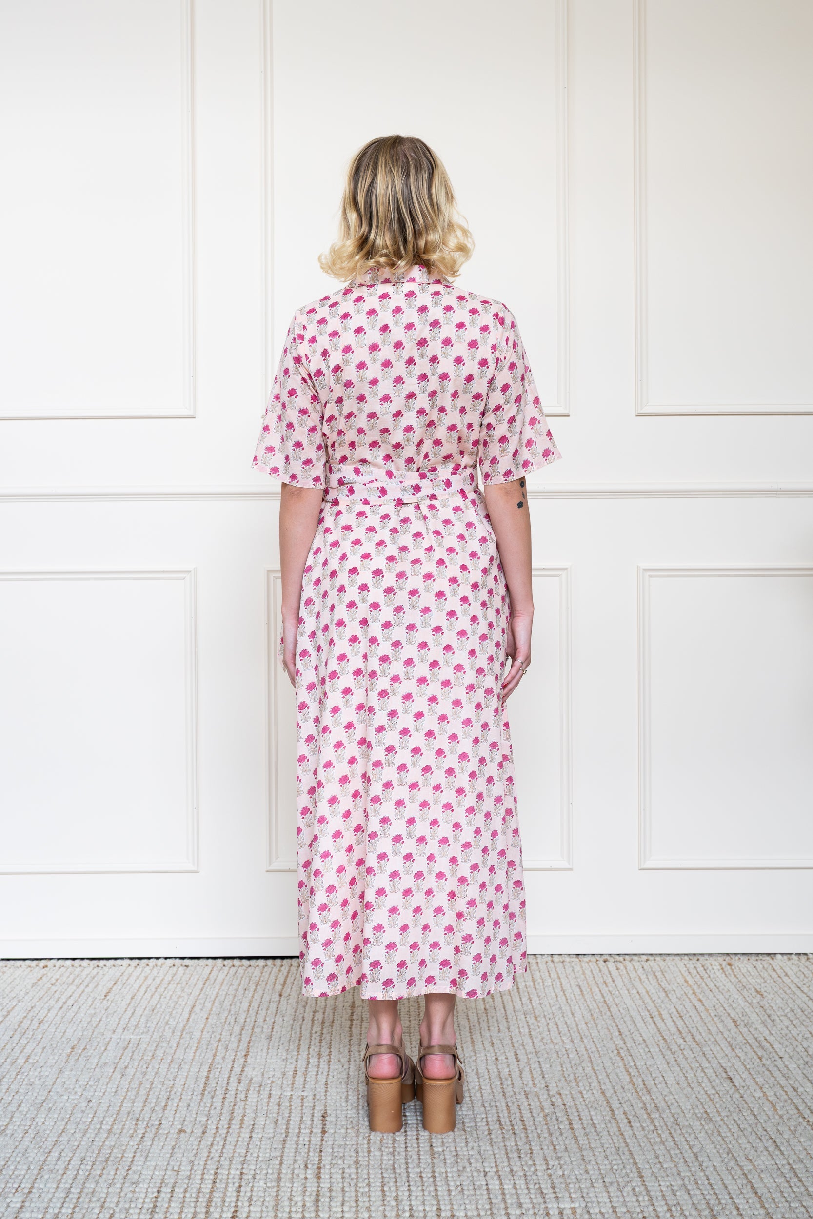 Back view of Bowral Dress in Rose Garden showing flattering A-line silhouette and breathable organic cotton fabric.