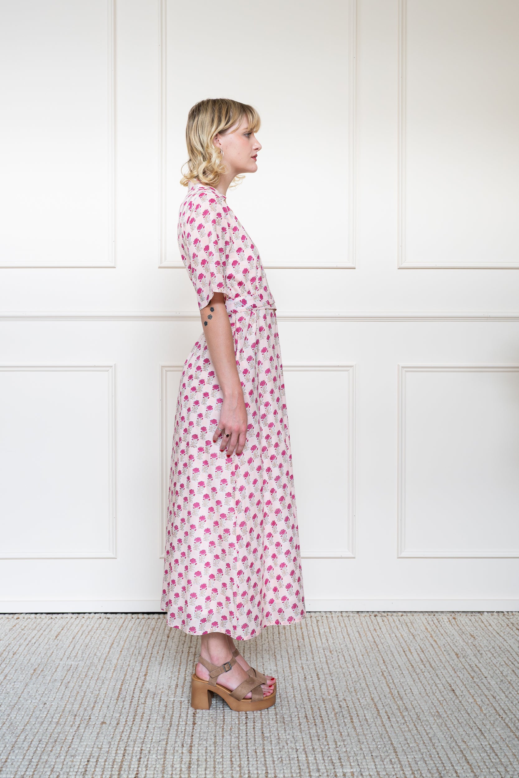 Side profile of Bowral Dress showing elbow length sleeves and modest maxi length fit.