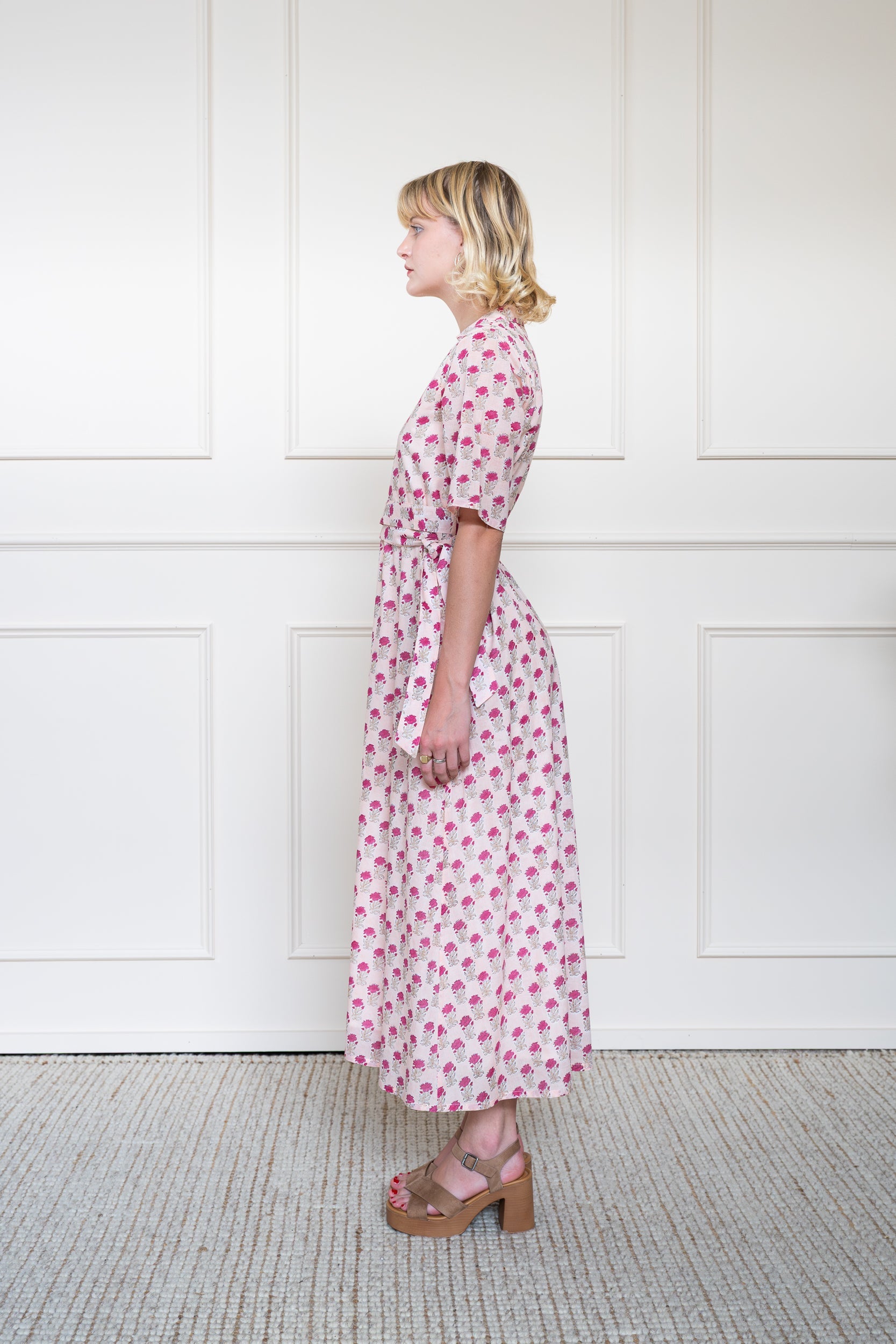 Side view of Bowral Dress in Rose Garden Pink showing floral hand block print pattern and relaxed summer styling.