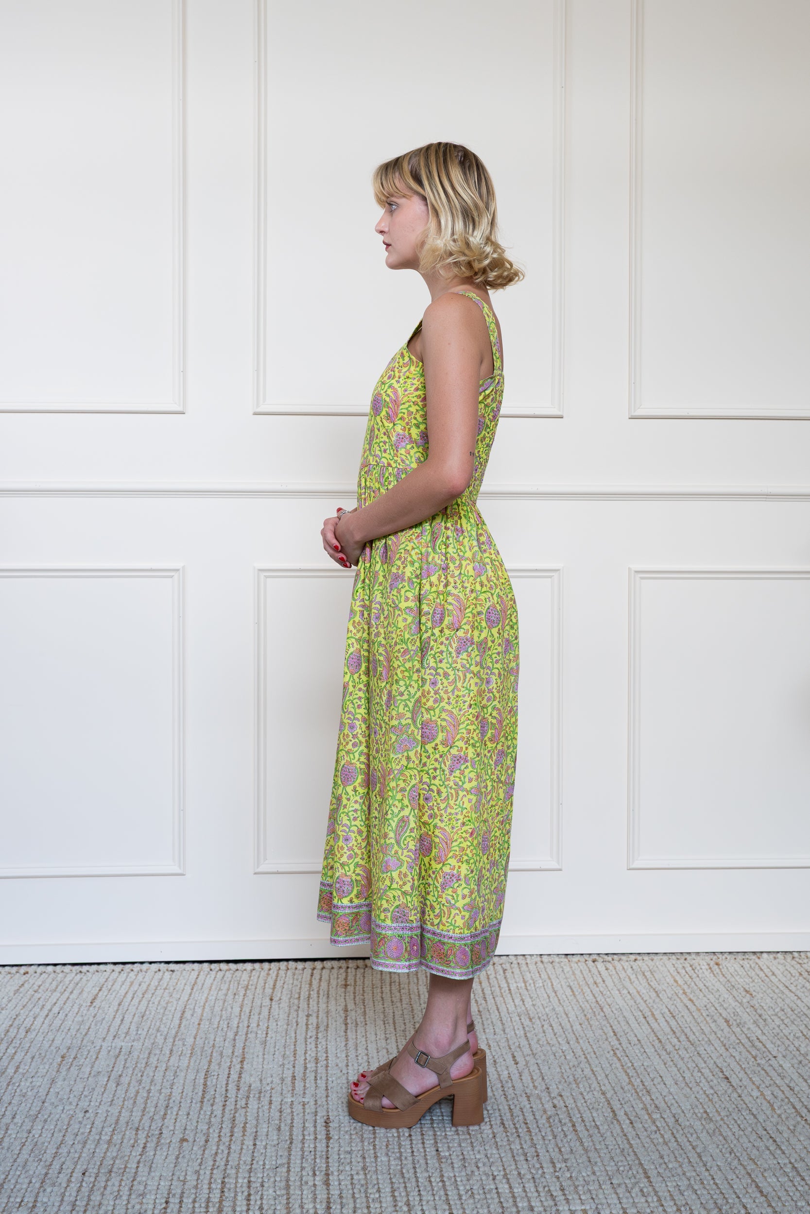 Side view of Cairns Dress in Lemon Myrtle showing floral hand block print pattern and relaxed summer styling.