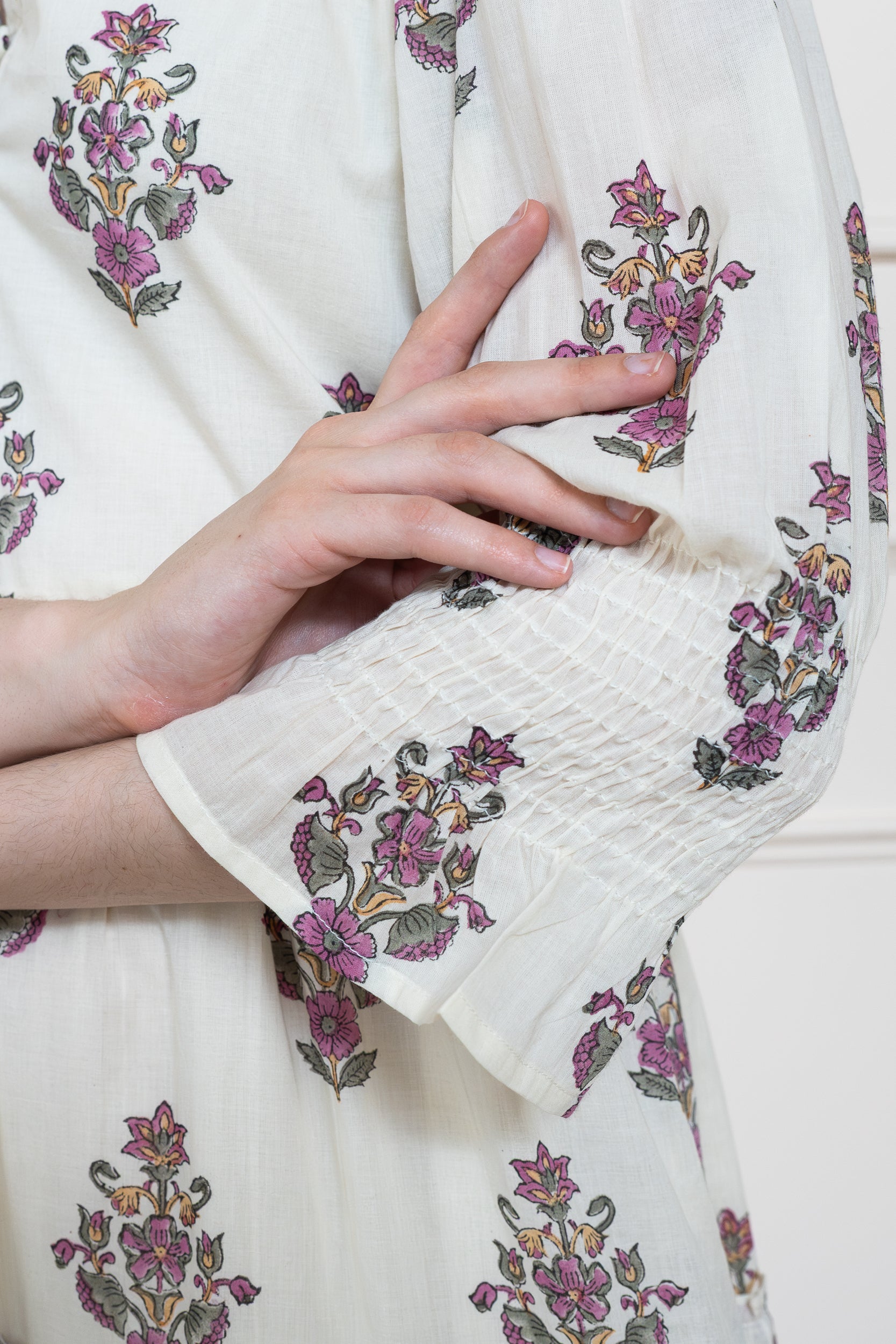 Close up of elbow length sleeve on Noosa Dress showing relaxed arm fit and sun safe coverage.