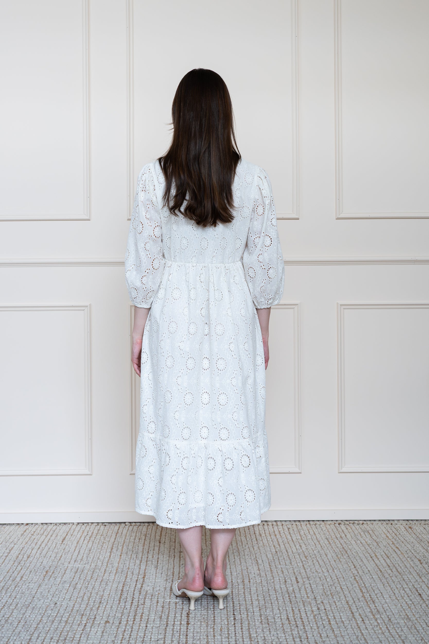 Back view of Tamarind Dress in Cotton Clouds showing flattering A-line silhouette and breathable white cotton.