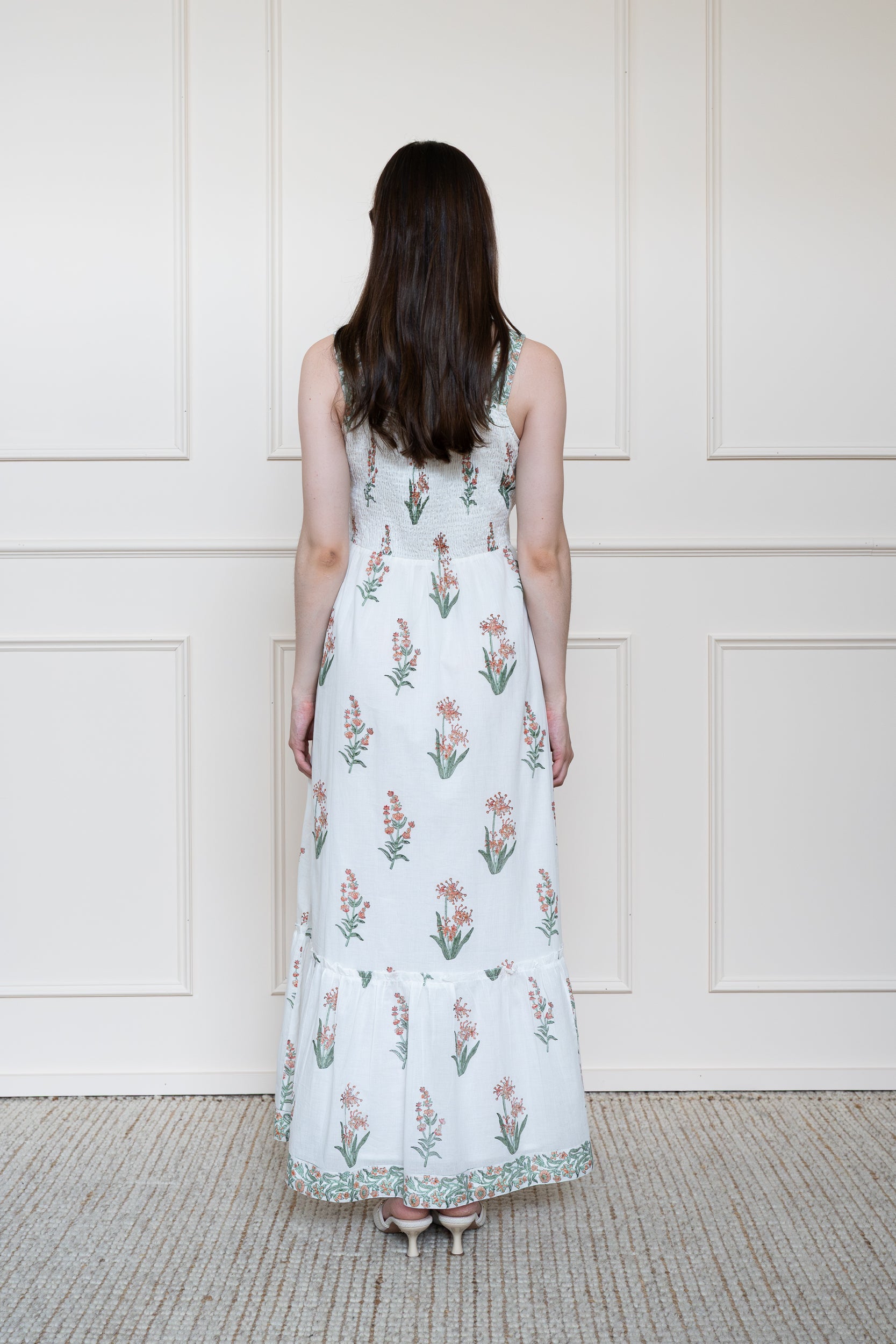 Back view of Whitsunday Dress in Coral Sands showing flattering A-line silhouette and breathable organic cotton.