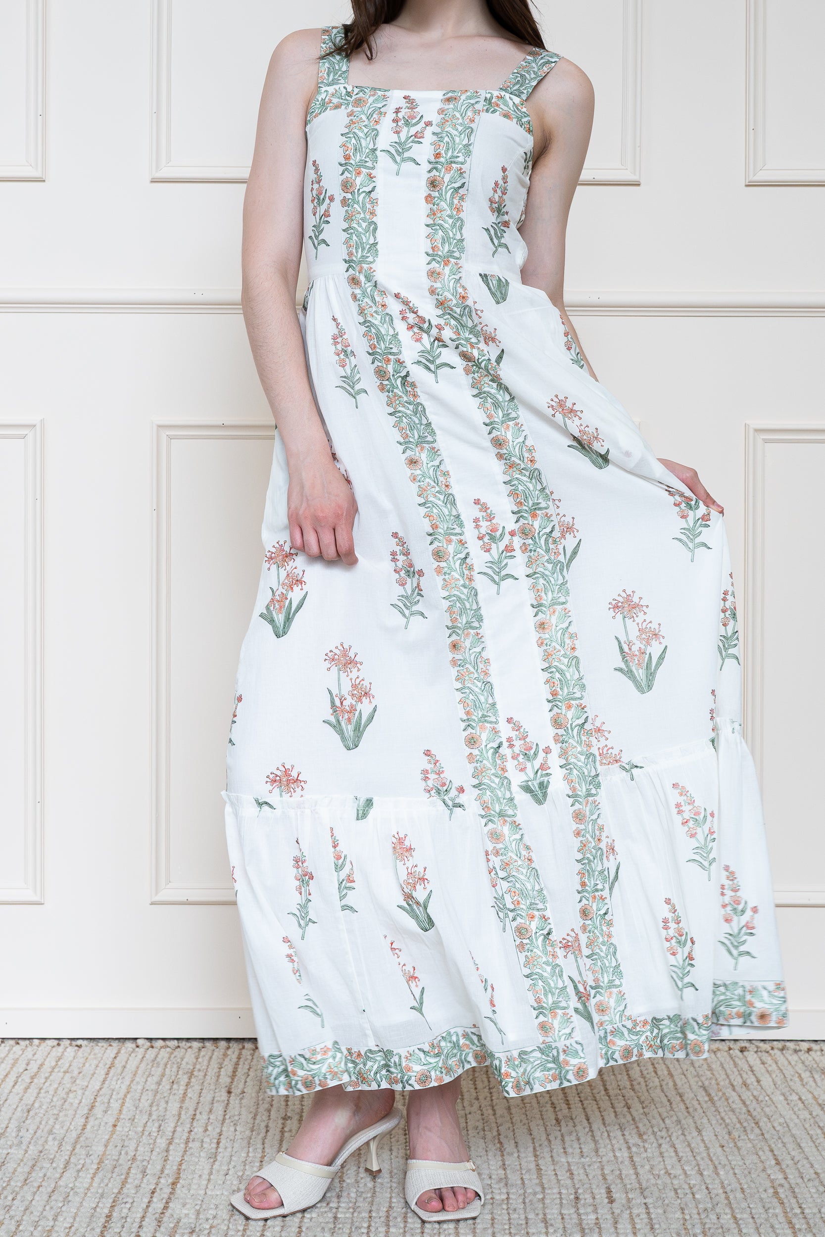 Whitsunday Dress in Coral Sands showing flowing white maxi skirt perfect for beach resort wear.