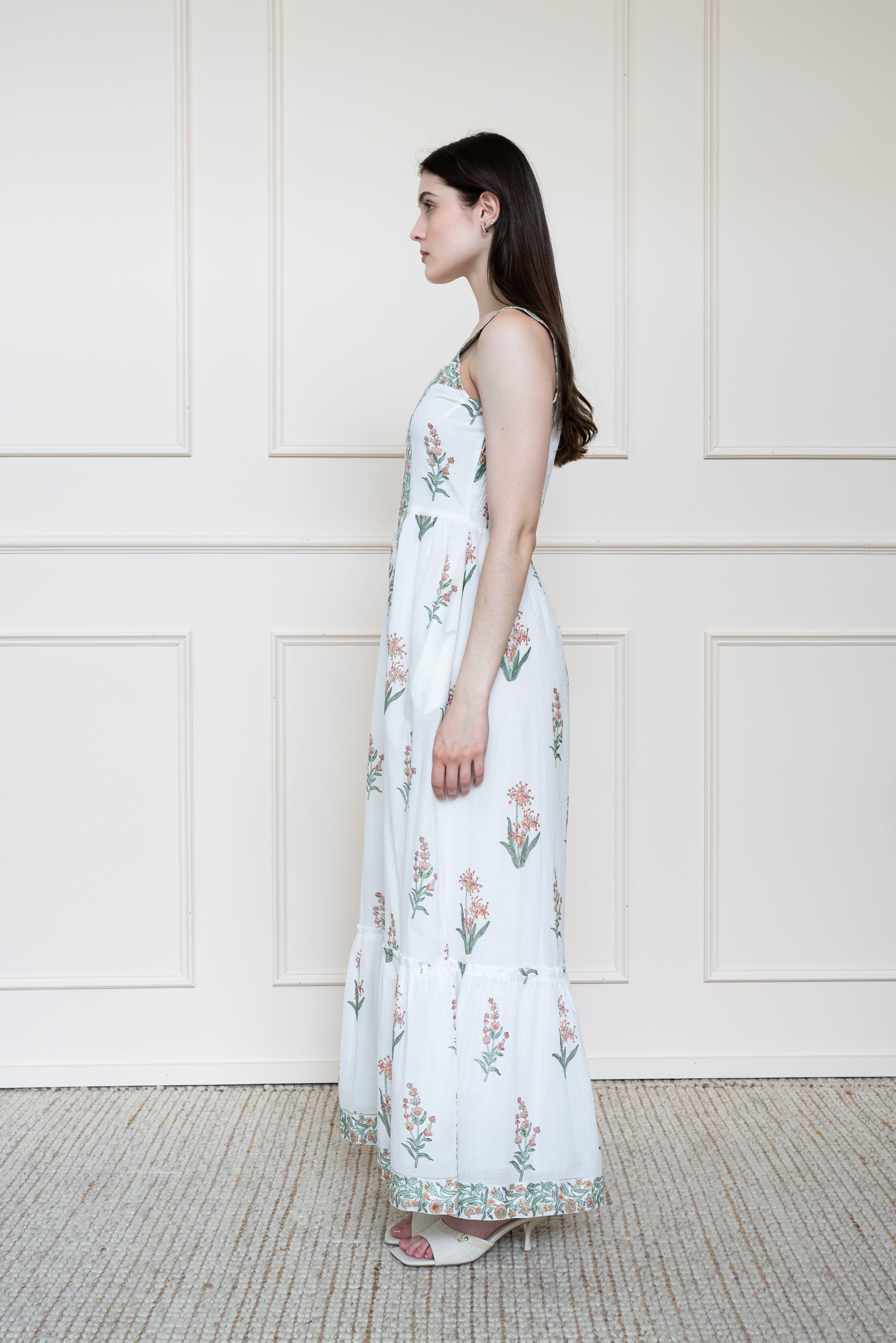Side view of Whitsunday Dress in Coral Sands showing floral hand block print pattern and relaxed summer styling.