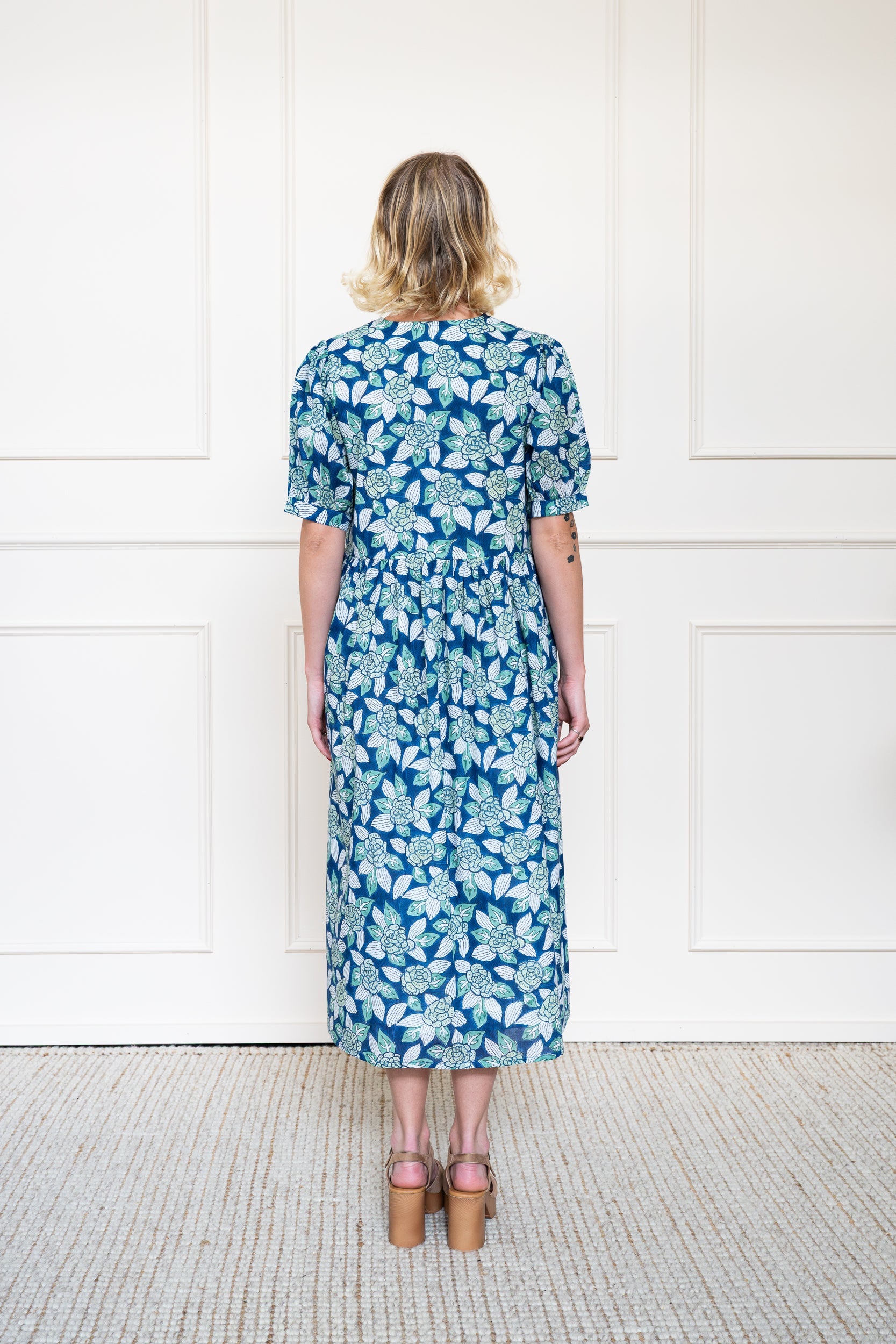 Back view of Yarra Valley Dress in blue showing flattering A-line silhouette and breathable Indian organic cotton fabric.