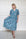 Mora Heritage Yarra Valley Dress in Ocean Garden Blue. Organic cotton midi dress with sleeves Australia luxury resort wear.