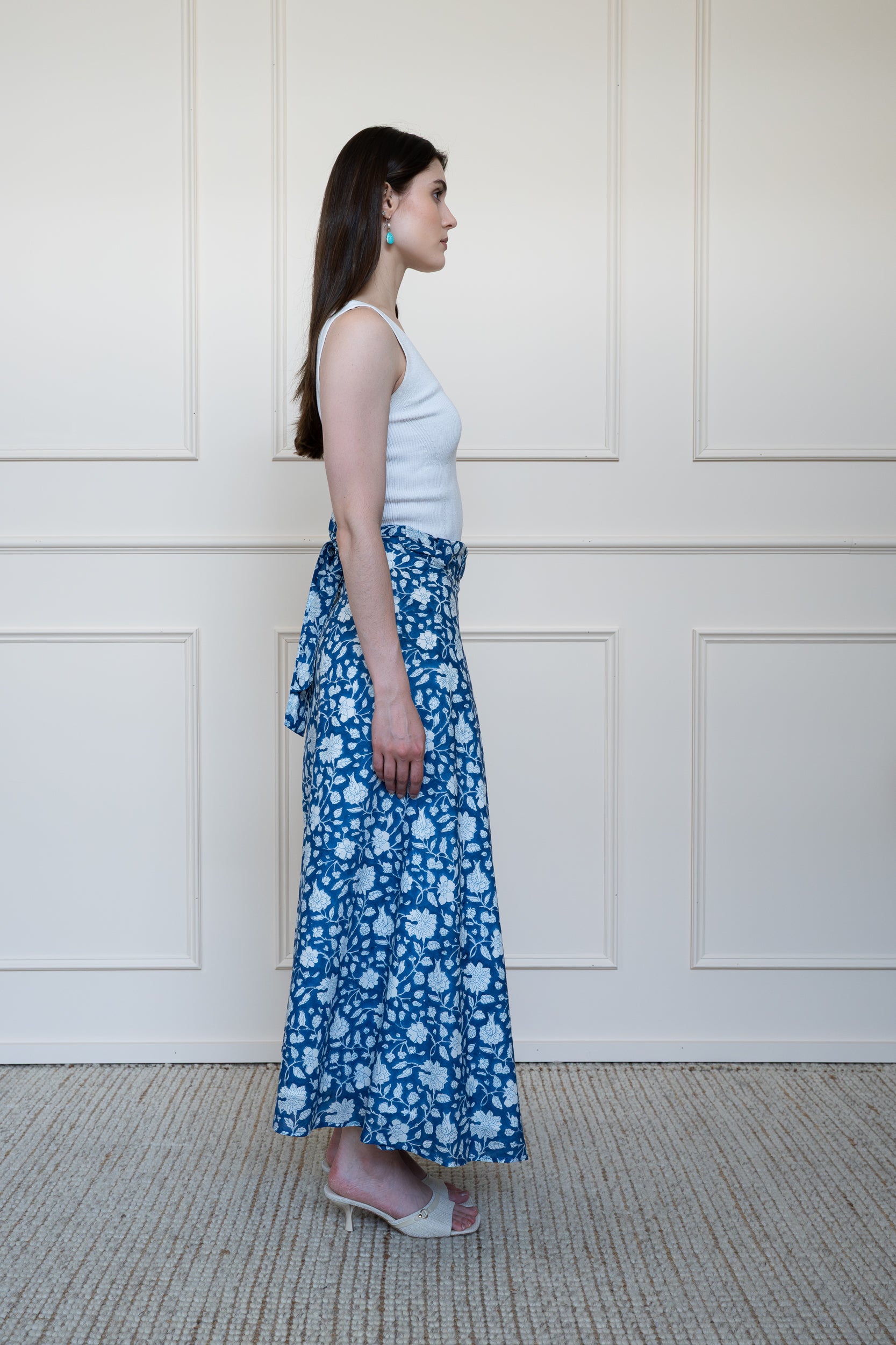 Side profile of Flinders Skirt in Midnight Bloom showing midi to maxi length and floral hand block print.