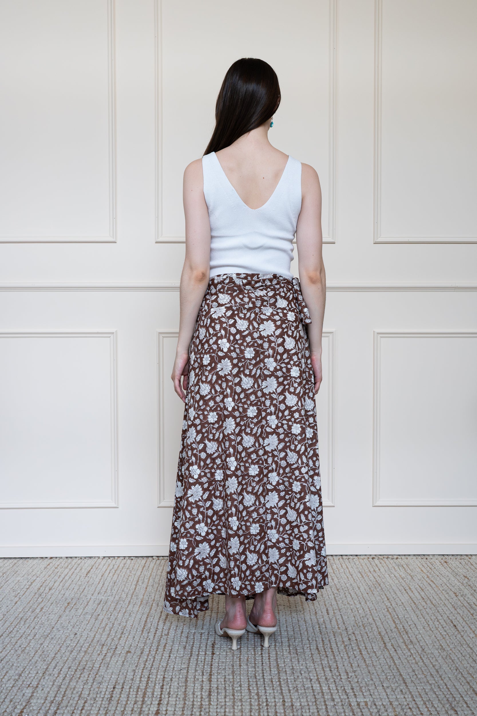 Back view of Flinders Skirt in Brown showing A-line silhouette and breathable organic cotton fabric.