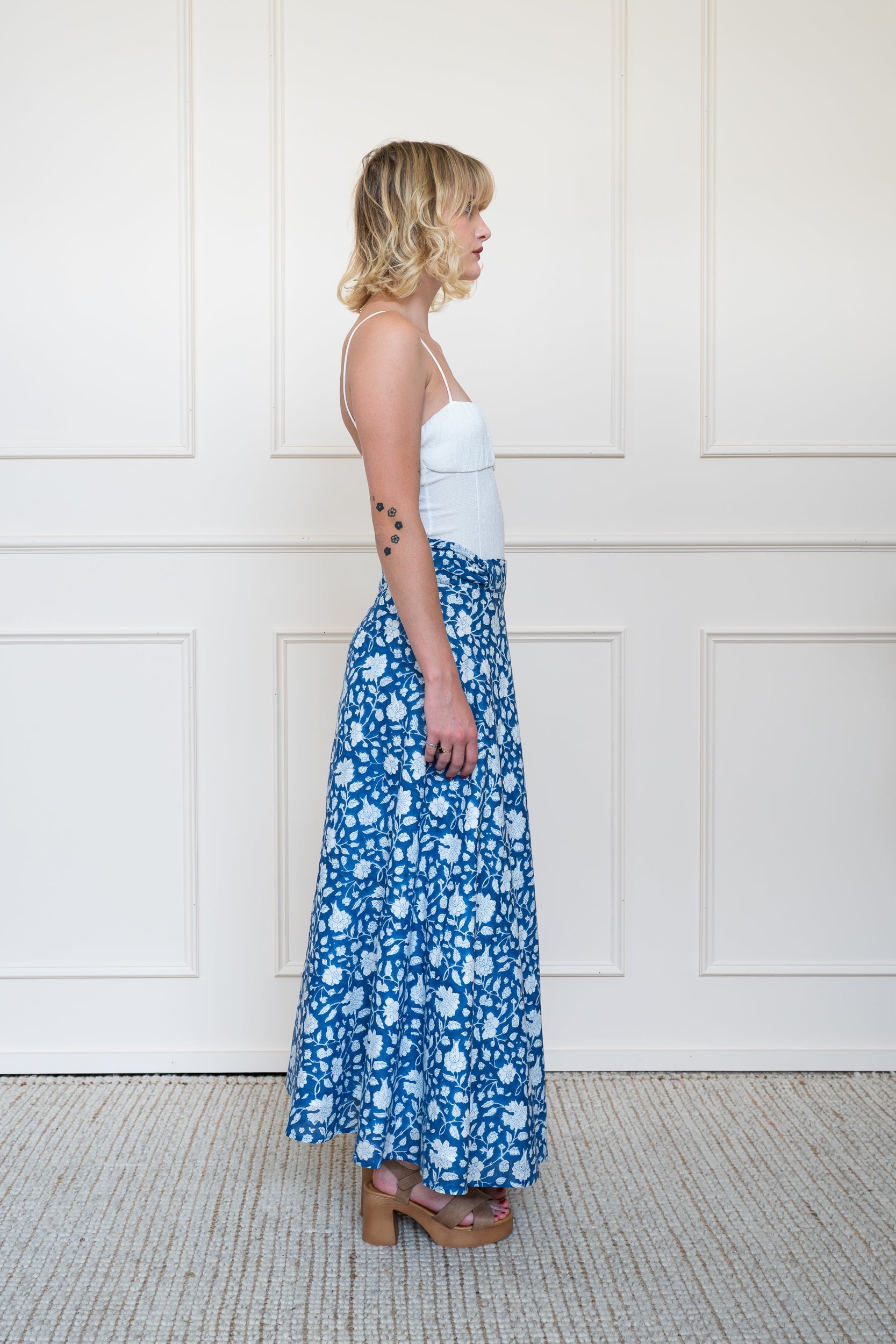 Side view of Flinders Skirt showing intricate blue floral block print pattern on organic cotton.