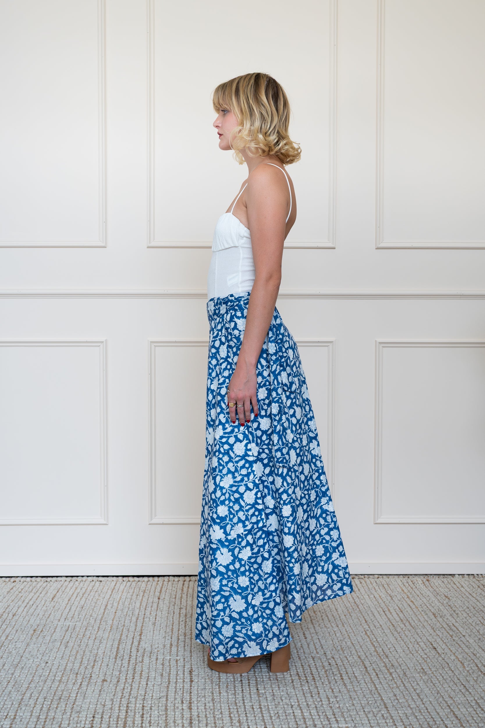 Back view of Flinders Skirt in Blue showing flattering waist fit and flowy hemline.