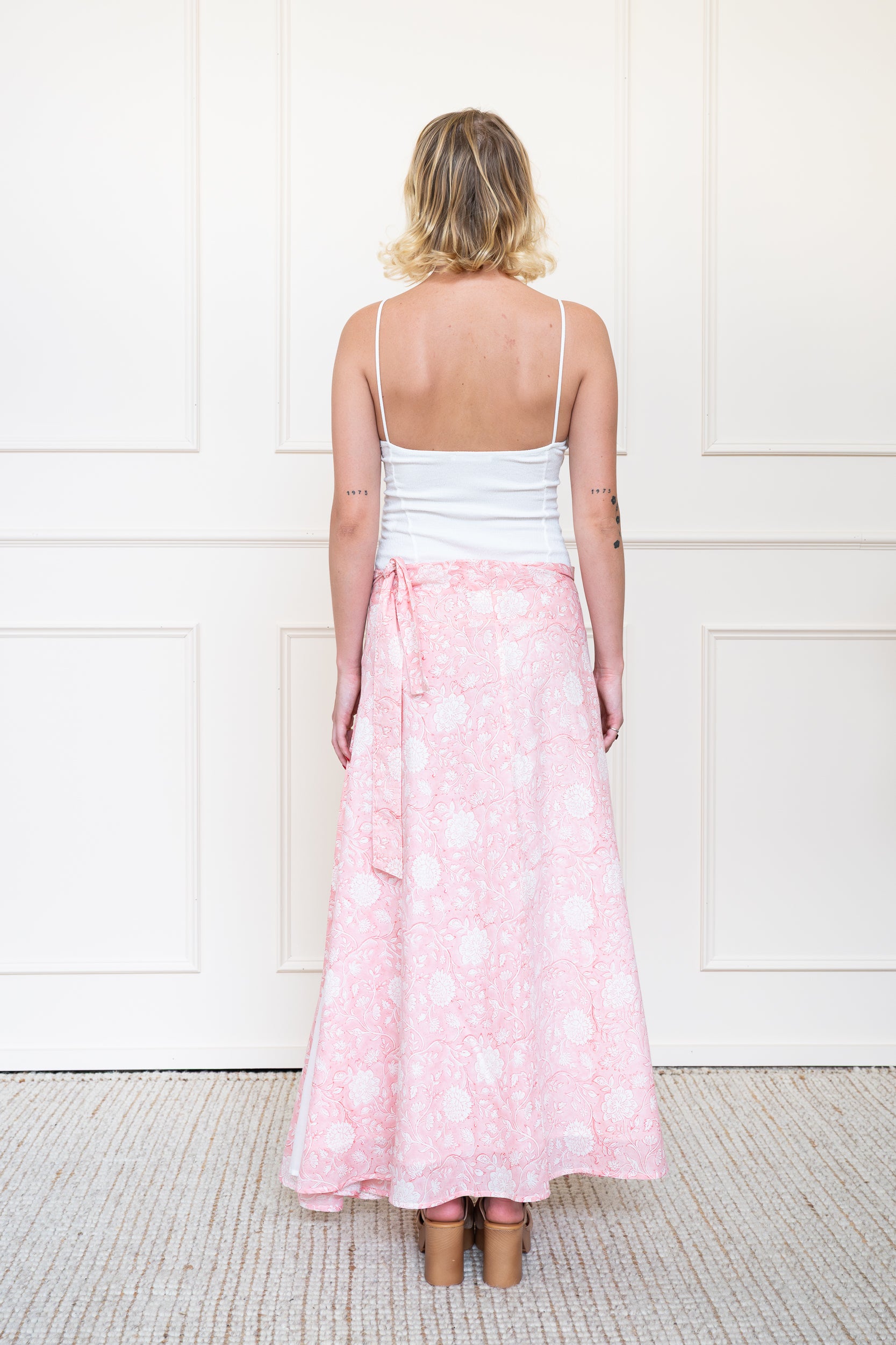Back view of Flinders Skirt in Pink showing flattering A-line silhouette and breathable organic cotton fabric.