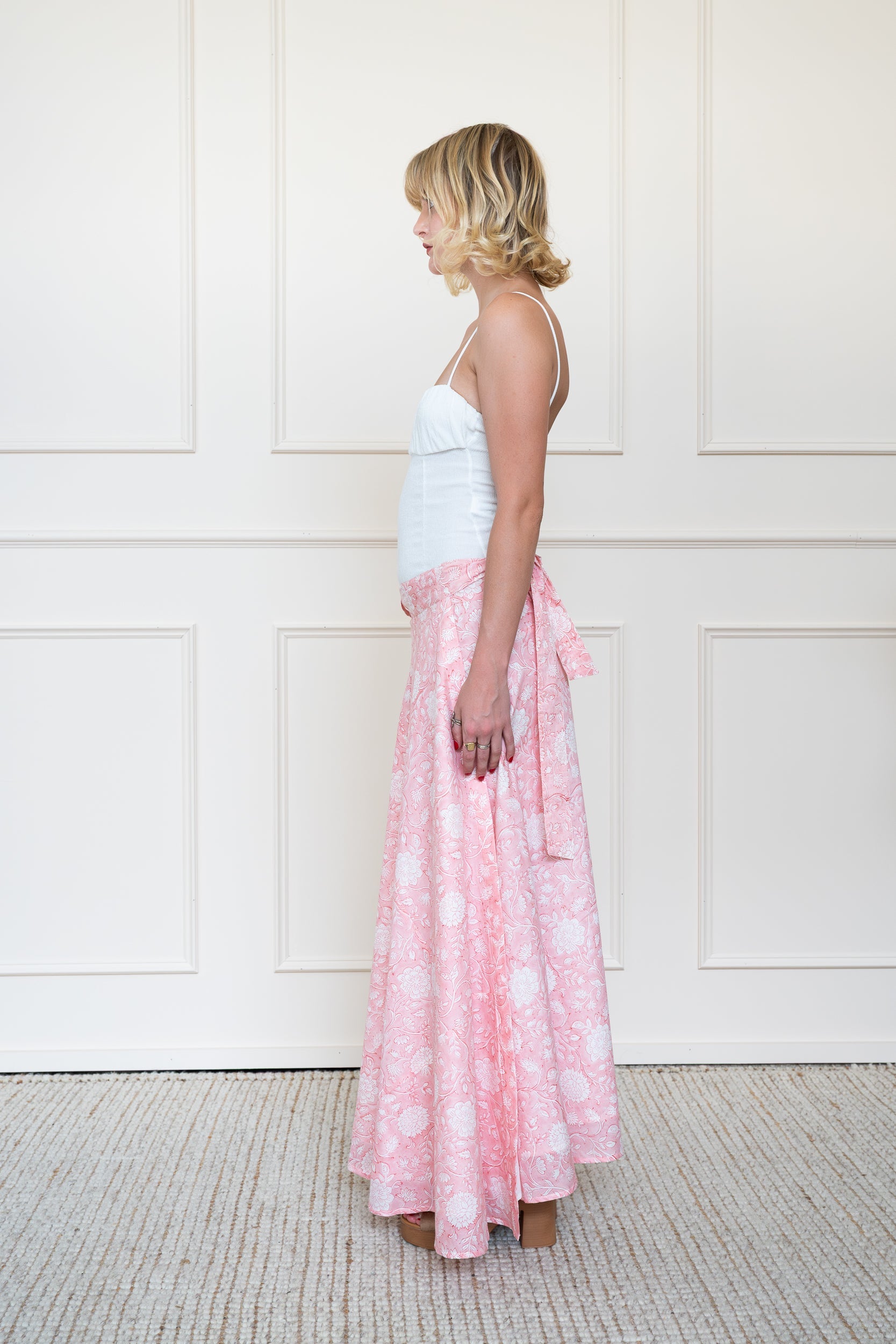 Side view of Flinders Skirt in Pink showing relaxed summer styling and lightweight cotton volume.